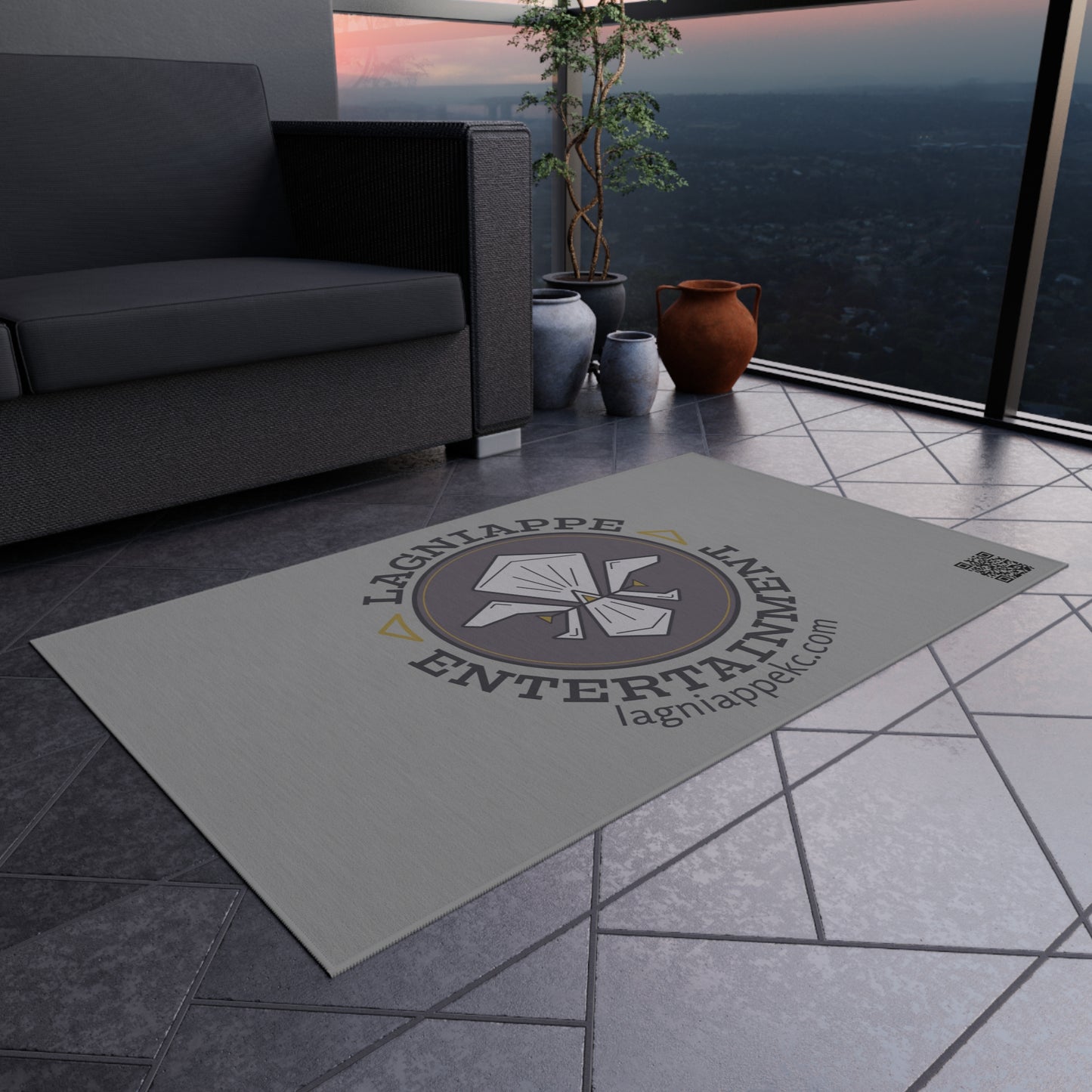 Lagniappe Entertainment Dark Color Logo Outdoor Rug