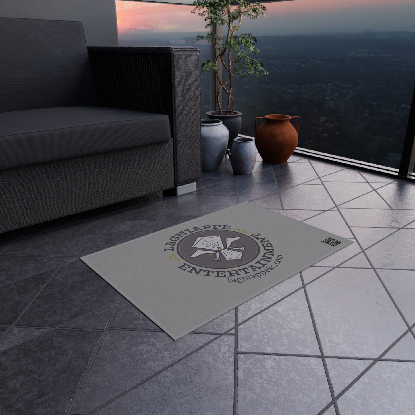Lagniappe Entertainment Dark Color Logo Outdoor Rug